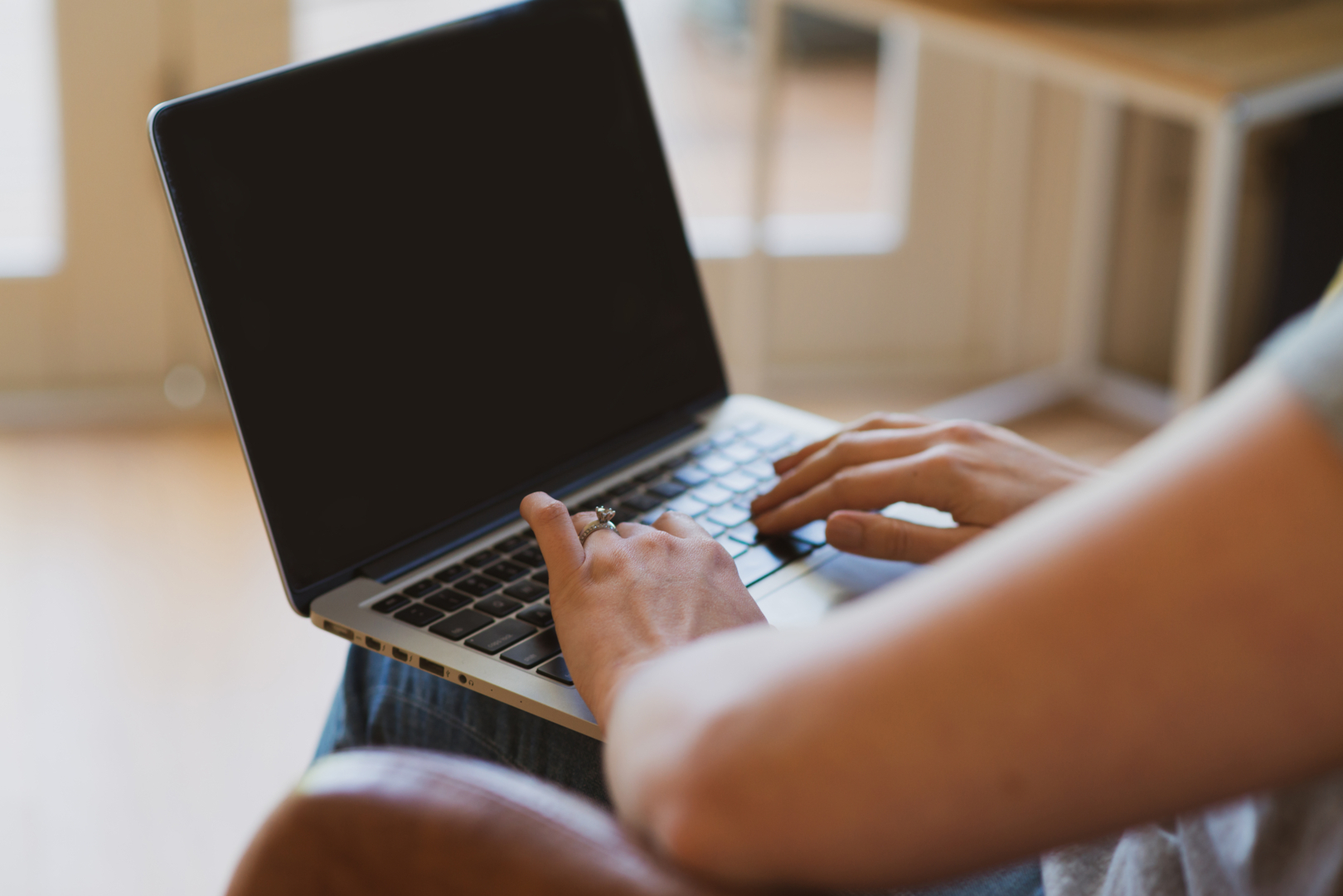 Aussie tradie reviewing cash flow figures on computer to start 2025 strong