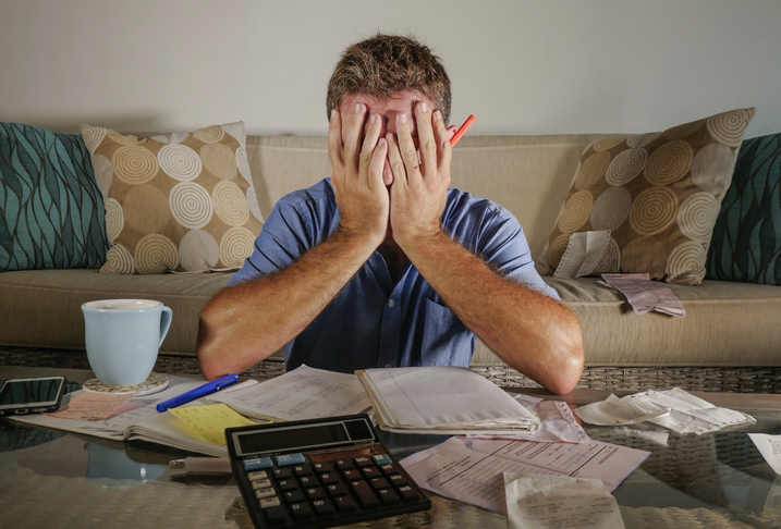 Tradie overwhelmed by paperwork and invoicing