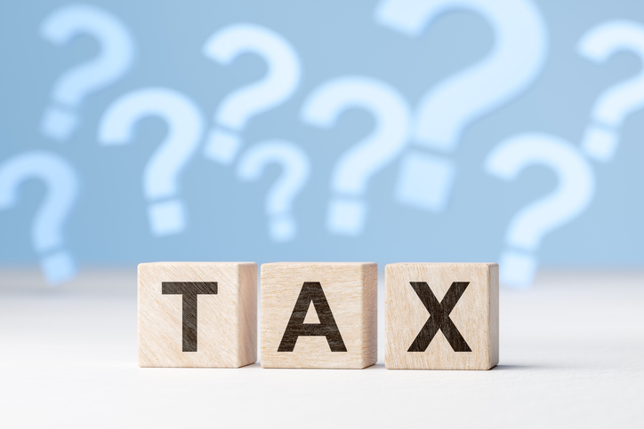 Blocks that spell the word tax