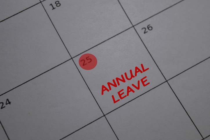 Close-up of a calendar with Annual Leave written on the 25th, representing Christmas shutdown planning and payroll for Australian tradie businesses.