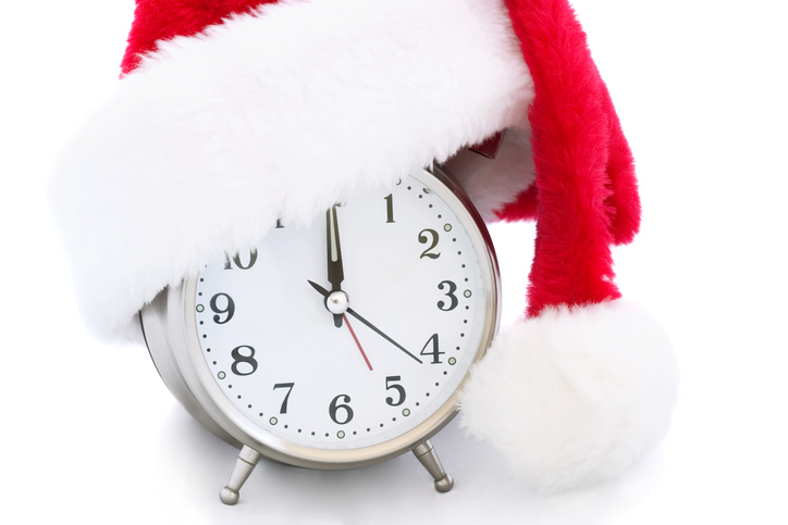 Clock with Christmas decorations counting down the days until the Christmas shutdown period for Australian tradie businesses